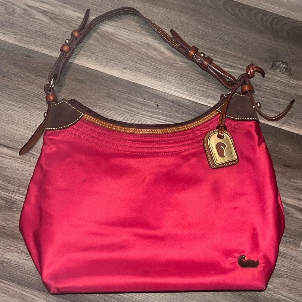 Dooney & Bourke boho sak purse in red with hot pink interior 1975 tag